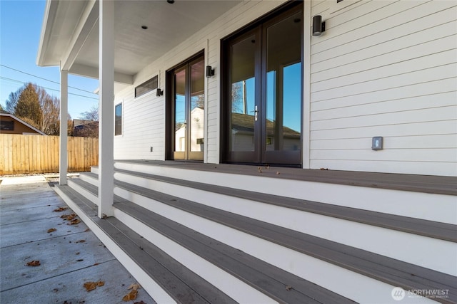 view of patio / terrace featuring fence