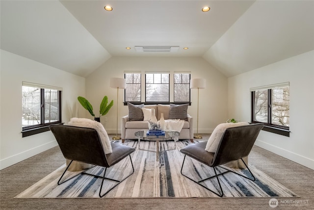 sitting room with vaulted ceiling, recessed lighting, and baseboards