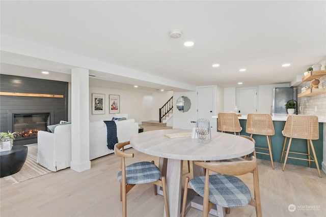 dining room with light hardwood / wood-style floors