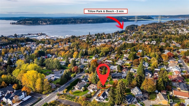 birds eye view of property featuring a water view