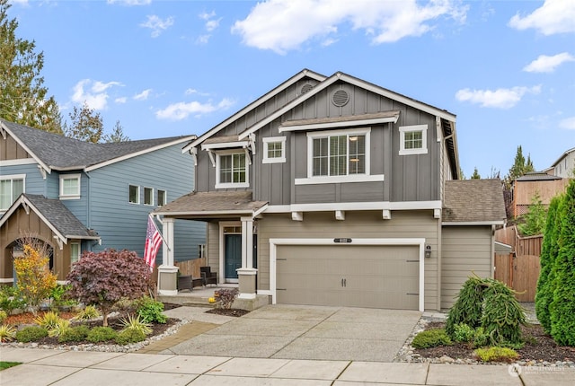 craftsman house with a garage