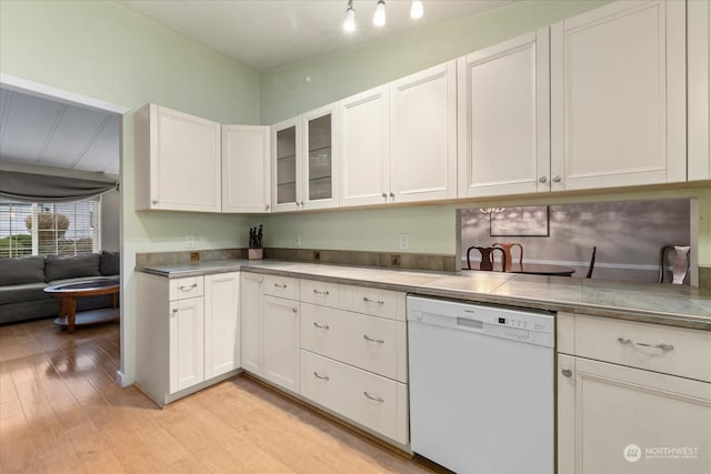 kitchen featuring white cabinetry, light hardwood / wood-style floors, and dishwasher