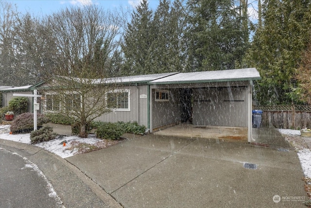 view of outbuilding featuring a carport