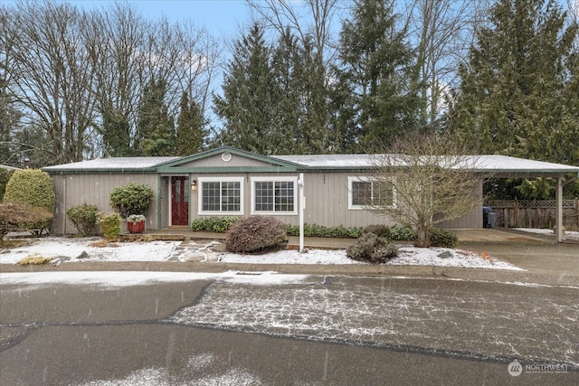 view of front of property with a carport