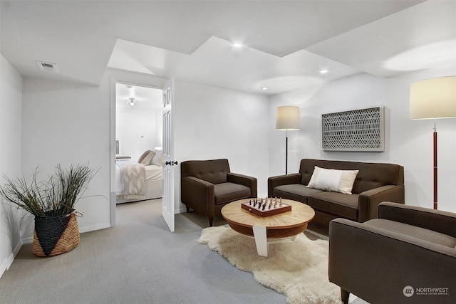 living room featuring light colored carpet