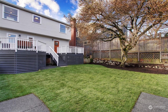 view of yard featuring a deck