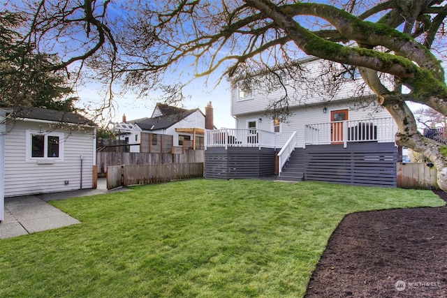 view of yard with a wooden deck