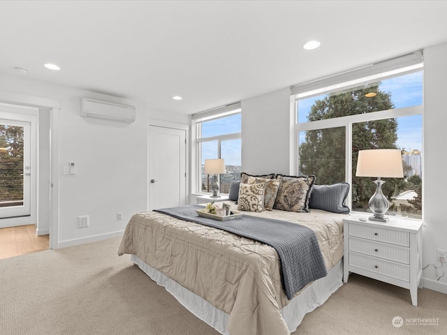 bedroom with light carpet and a wall mounted air conditioner