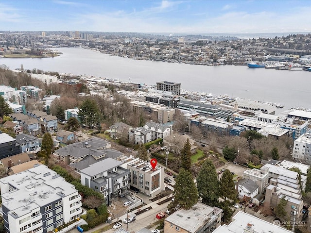 birds eye view of property featuring a water view