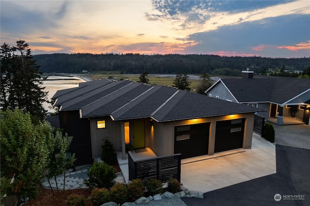 view of front of property with a garage