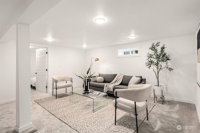 living room with light carpet and baseboards