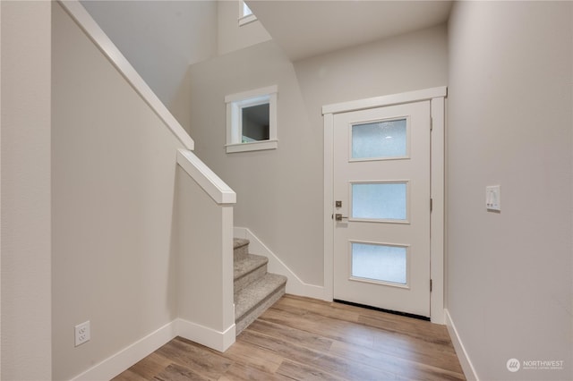 entrance foyer with light wood-type flooring