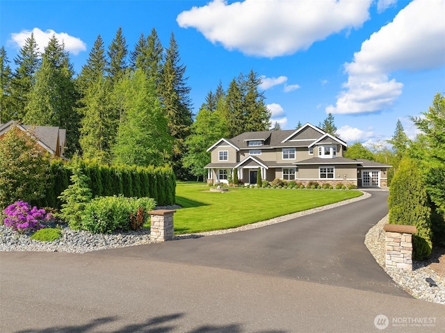 view of front of home with a front yard