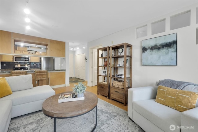 300 110th Ave NE # 611, Bellevue, WA 98004 - living area featuring light wood-type flooring