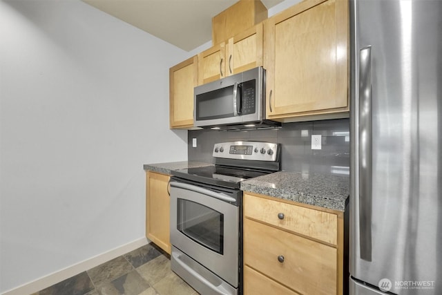 300 110th Ave NE # 611, Bellevue, WA 98004 - kitchen featuring backsplash, stone finish flooring, baseboards, light brown cabinetry, and stainless steel appliances