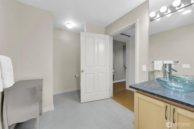300 110th Ave NE # 611, Bellevue, WA 98004 - bathroom with baseboards and vanity