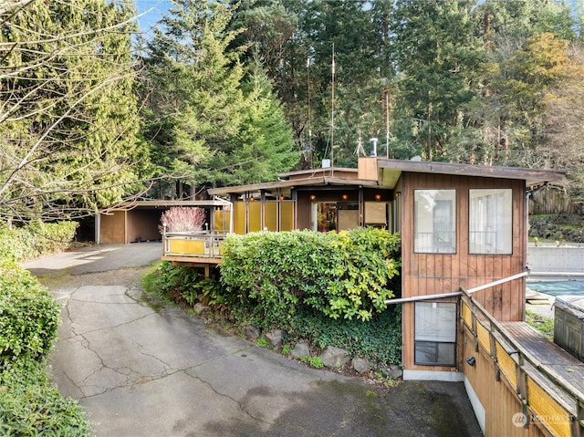 view of front of house featuring a deck