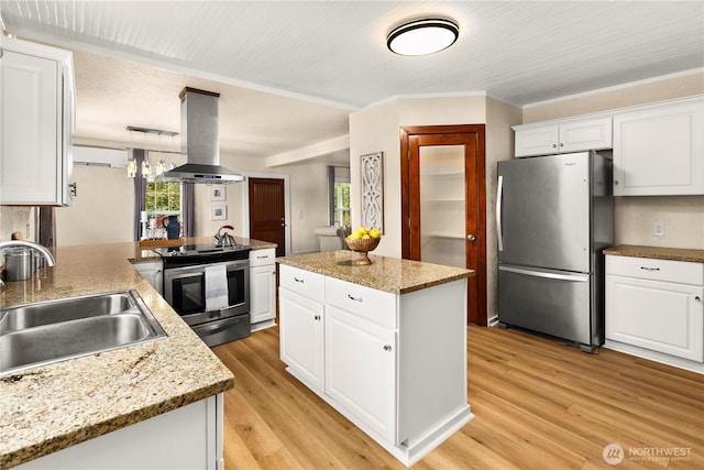 kitchen featuring light wood-style flooring, a sink, white cabinetry, appliances with stainless steel finishes, and island range hood