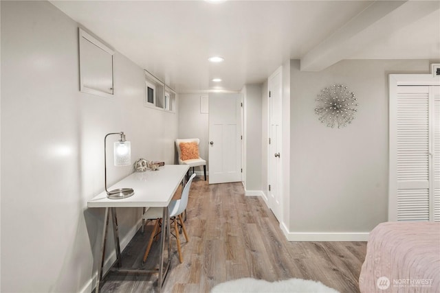 office with baseboards, recessed lighting, and light wood-style floors