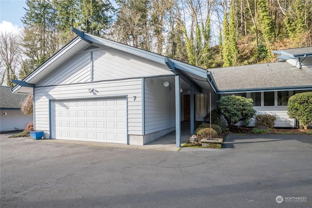 view of front of home featuring a garage