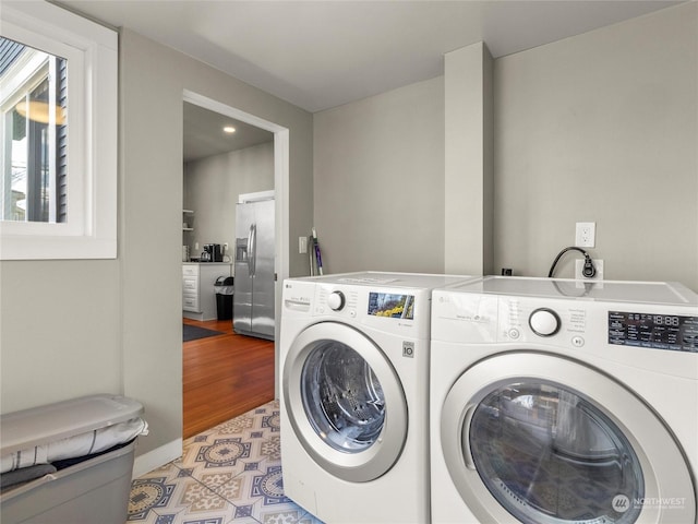 laundry area featuring independent washer and dryer