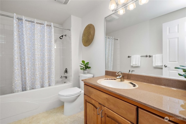 full bathroom featuring vanity, shower / bath combination with curtain, and toilet