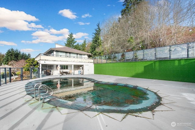 view of pool with a patio