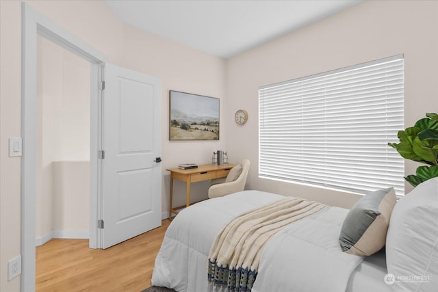 bedroom featuring light wood-type flooring