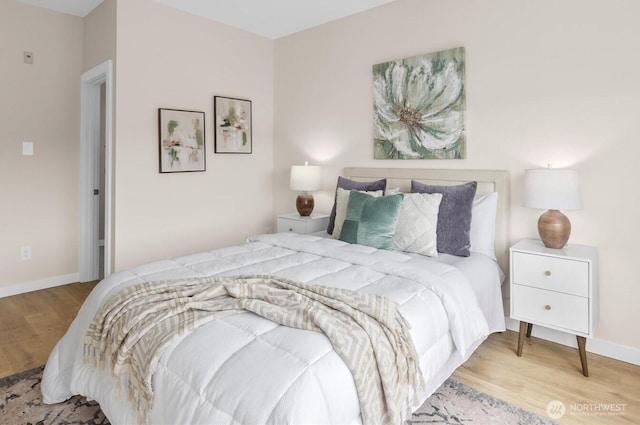 bedroom featuring light wood-type flooring