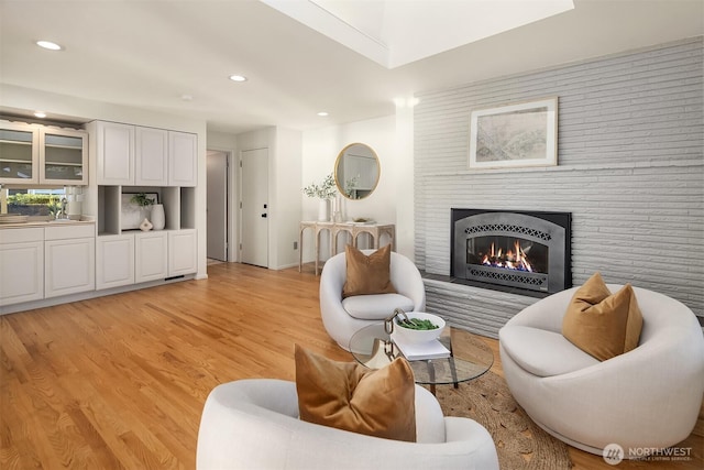 living room with light hardwood / wood-style flooring