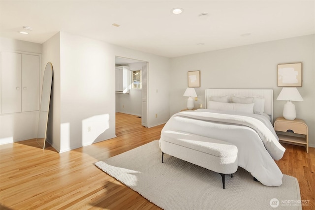 bedroom featuring wood-type flooring