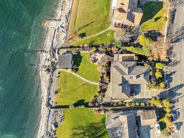 bird's eye view with a water view