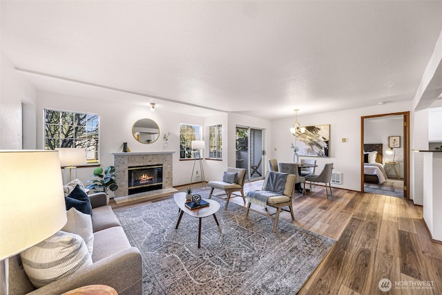 living room with a wealth of natural light and hardwood / wood-style floors