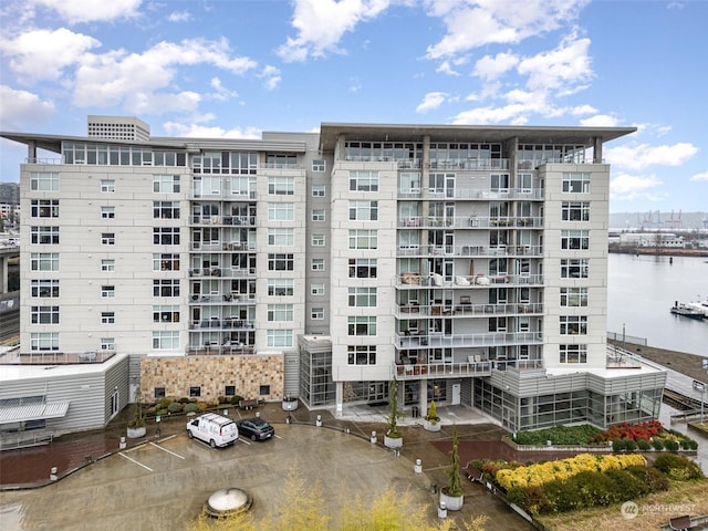 view of building exterior featuring a water view