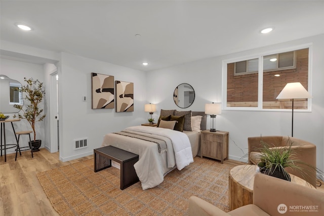 bedroom featuring light hardwood / wood-style flooring