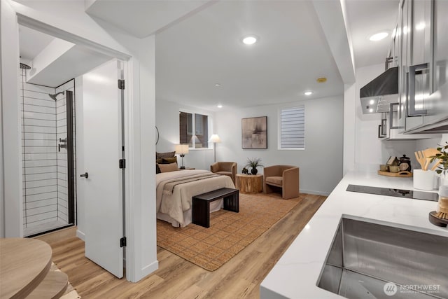 bedroom with light wood-type flooring