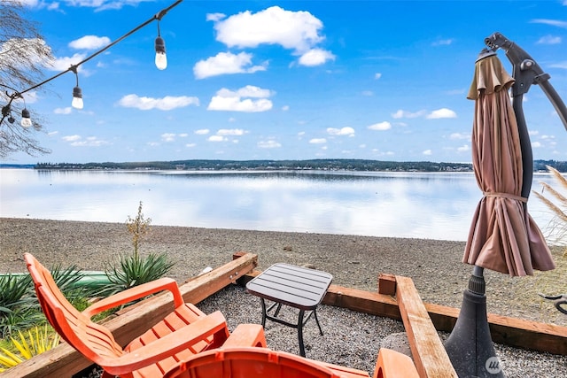 exterior space with a water view