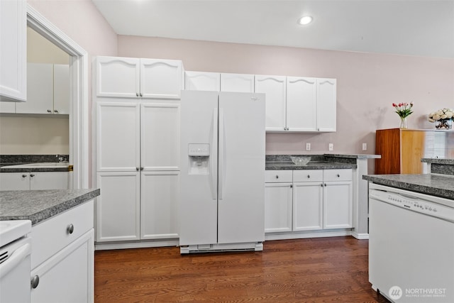 kitchen with recessed lighting, white appliances, dark wood-style flooring, and white cabinetry