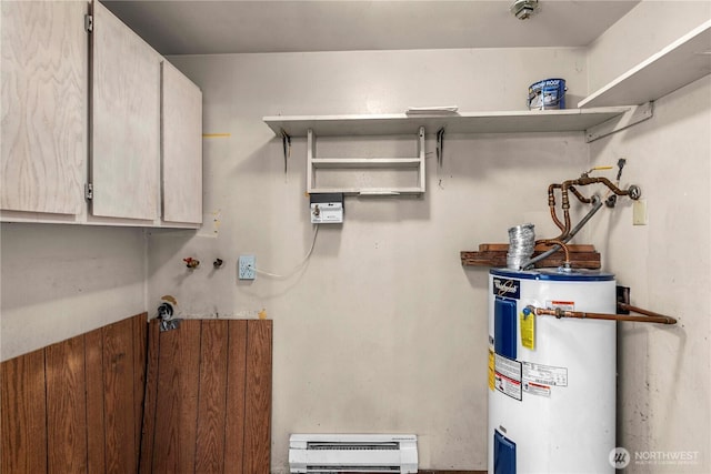 utility room featuring water heater and a baseboard heating unit