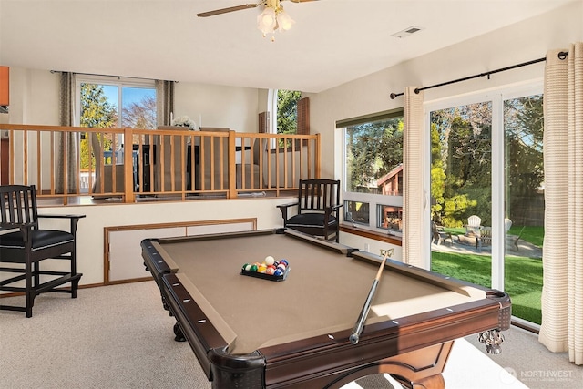 playroom with ceiling fan and light colored carpet