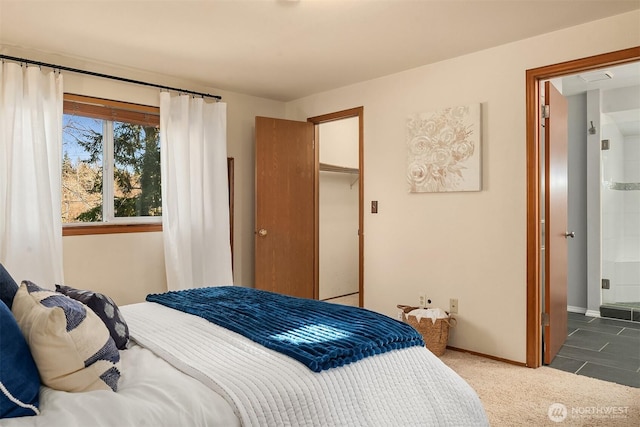 carpeted bedroom featuring a closet