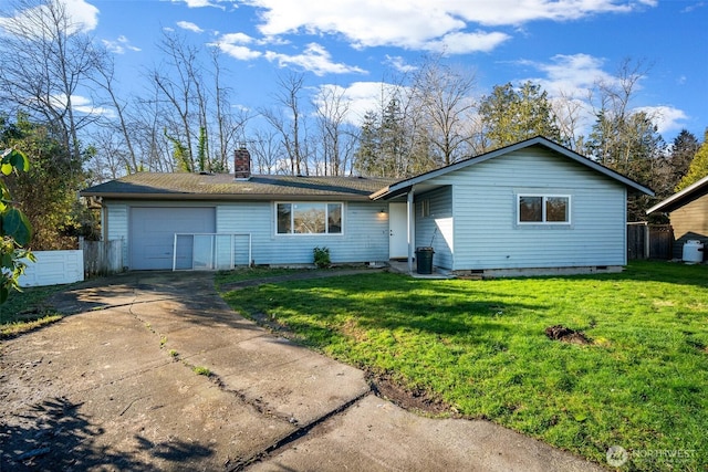 ranch-style home with a garage, fence, driveway, crawl space, and a front yard