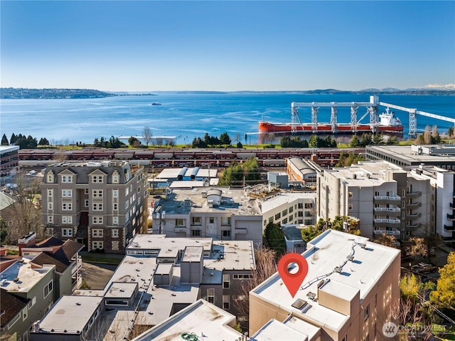 birds eye view of property featuring a water view