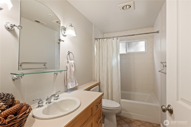 full bathroom featuring vanity, shower / bathtub combination with curtain, and toilet