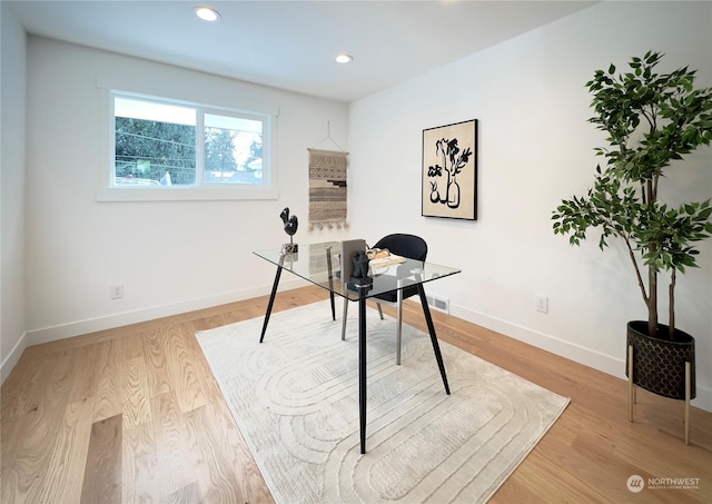 office with recessed lighting, baseboards, and light wood finished floors