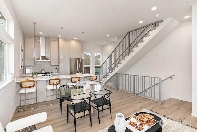 dining room featuring light hardwood / wood-style flooring