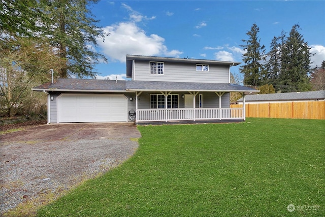 view of front of house with a garage, covered porch, and a front lawn