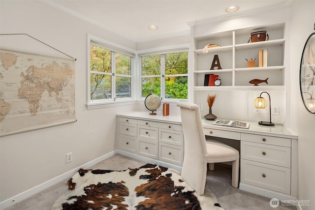 office featuring baseboards, light colored carpet, crown molding, built in desk, and recessed lighting