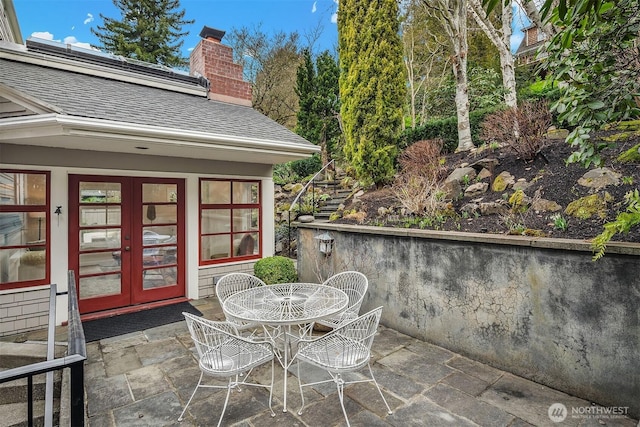 view of patio / terrace with french doors and outdoor dining area