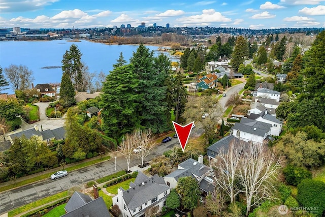 aerial view featuring a water view and a residential view